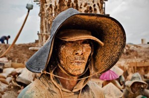 A tin miner in Bangka, Indonesia